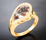 Массивное золотое кольцо с крупным цирконом падпараджа 4,97 карата и бесцветными цирконами