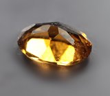 Оранжевато-желтый турмалин 0,7 карата