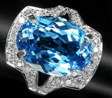 Кольцо с ярким голубым топазом в россыпи цирконов Серебро 925