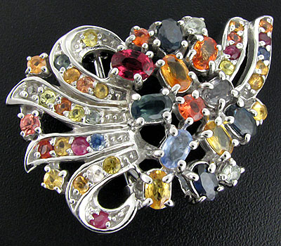 Роскошная брошь с разноцветными сапфирами